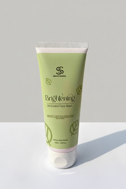 Green tube of skincare product on a white background